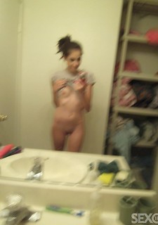 sexy teen brunette making naked selfie